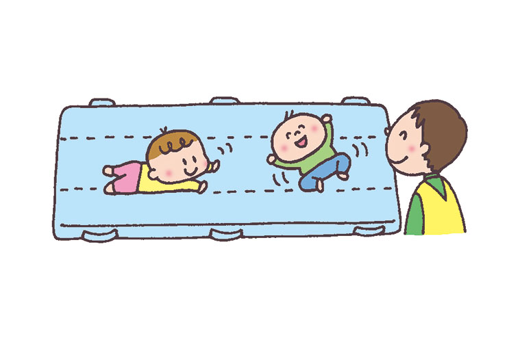 マットで遊ぶ11月の乳児のイラスト